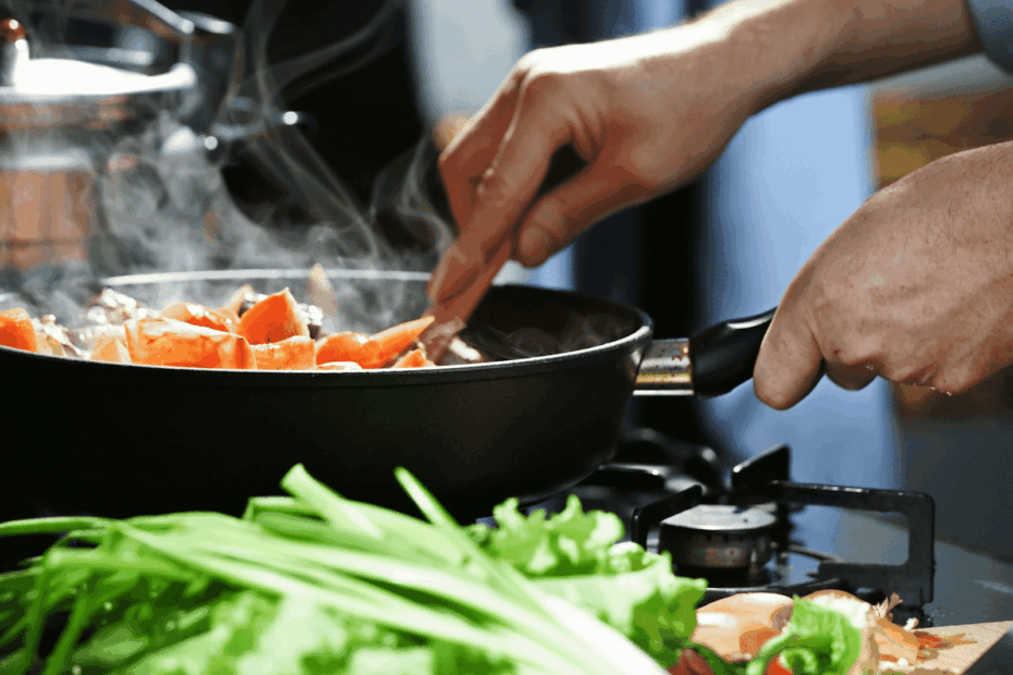 Person cooking vegetables in a steaming pan on a stove